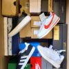 The photo shows a package with footwear in the category BS.