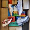 The photo shows a package with footwear in the category BS.