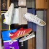 The photo shows a package with footwear in the category BS.