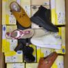 The photo shows a package with footwear in the category SM.