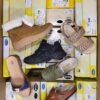 The photo shows a package with footwear in the category SM.
