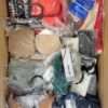 The photo shows a package with clothing in the category AU.