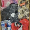 The photo shows a package with clothing in the category AJS.