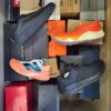 The photo shows a package with footwear in the category CS.