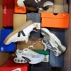 The photo shows a package with footwear in the category CS.