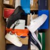 The photo shows a package with footwear in the category CS.