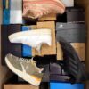 The photo shows a package with footwear in the category CS.