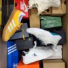 The photo shows a package with footwear in the category CS.