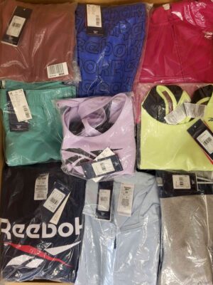 The photo shows a package with clothing in the category R.