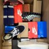 The photo shows a package with footwear in the category CS.