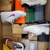 The photo shows a package with footwear in the category CS.