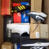 The photo shows a package with footwear in the category CS.