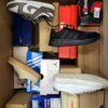 The photo shows a package with footwear in the category CS.