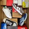 The photo shows a package with footwear in the category CS.