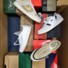 The photo shows a package with footwear in the category CS.