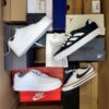 The photo shows a package with footwear in the category CS.