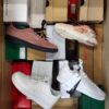 The photo shows a package with footwear in the category CS.