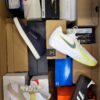 The photo shows a package with footwear in the category CS.