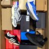 The photo shows a package with footwear in the category CS.
