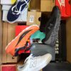 The photo shows a package with footwear in the category CS.