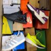 The photo shows a package with footwear in the category CS.