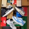 The photo shows a package with footwear in the category CS.
