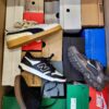 The photo shows a package with footwear in the category CS.