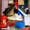 The photo shows a package with footwear in the category CS.