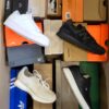 The photo shows a package with footwear in the category CS.
