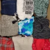 The photo shows a package with clothing in the category TSC.