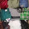 The photo shows a package with clothing in the category TSC.