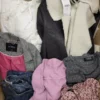The photo shows a package with clothing in the category TSC.