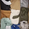 The photo shows a package with clothing in the category TSC.