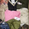 The photo shows a package with clothing in the category TSC.