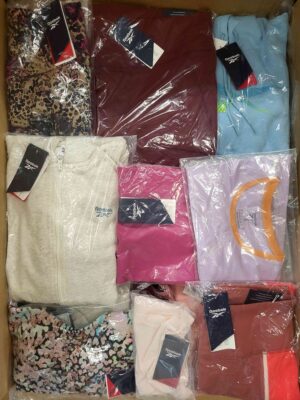 The photo shows a package with clothing in the category R.