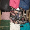 The photo shows a package with clothing in the category TSC.