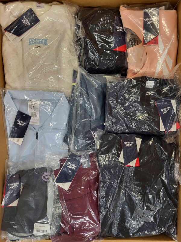 The photo shows a package with clothing in the category R.