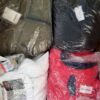 The photo shows a package with clothing in the category AJW.