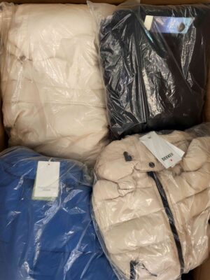 The photo shows a package with clothing in the category AJW.