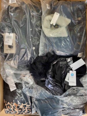 The photo shows a package with clothing in the category AJW.