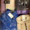 The photo shows a package with clothing in the category AJW.