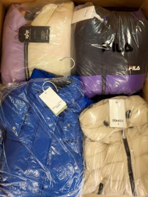 The photo shows a package with clothing in the category AJW.