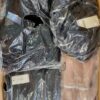 The photo shows a package with clothing in the category AJW.