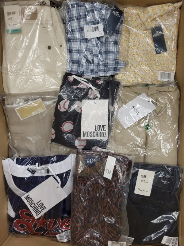 The photo shows a package with clothing in the category AW.