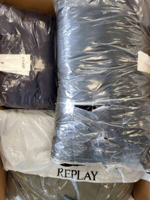 The photo shows a package with clothing in the category AJW.