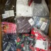The photo shows a package with clothing in the category AP.