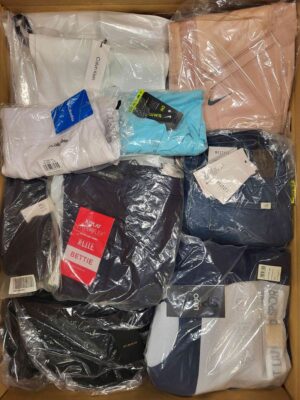 The photo shows a package with clothing in the category AW.