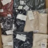 The photo shows a package with clothing in the category YA.
