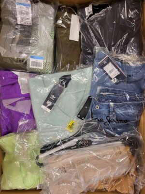 The photo shows a package with clothing in the category AW.