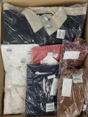The photo shows a package with clothing in the category YA.